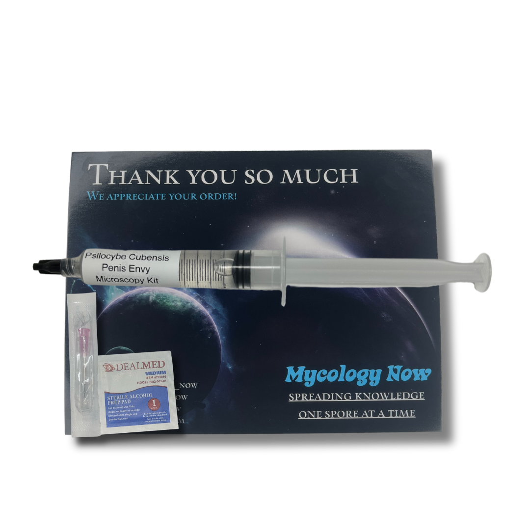 Official MycologyNow product image showing a microscopy spore kit and syringe packaging